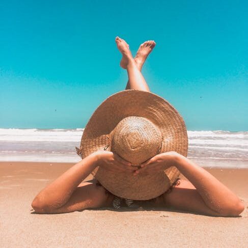 Person Laying On Sand
